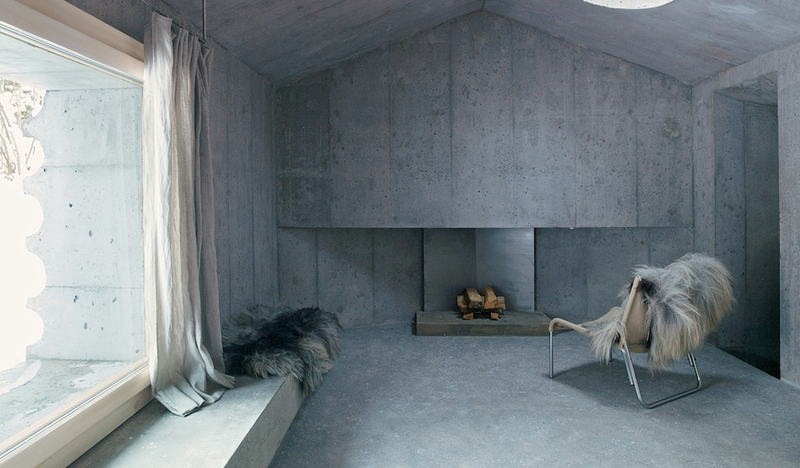 Illustration for article titled This Cozy Log Cabin in the Swiss Alps Is Completely Made of Concrete